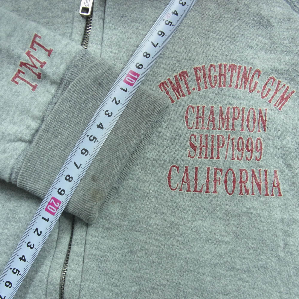 TMT ティーエムティー CHAMPION SHIP FIGHTING CLUB バック ロゴ ジップ パーカー コットン 日本製 グレー系 M【中古】
