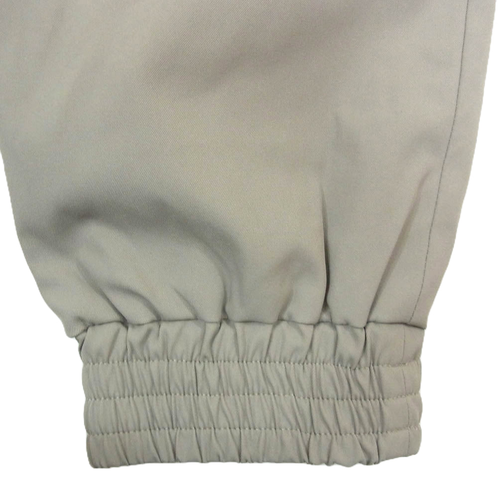 WIND AND SEA ウィンダンシー 23SS WDS-C-UMB-23-Q3-03 × UMBRO アンブロ ナイロン トラック パンツ グレー系 L【中古】