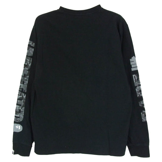 A BATHING APE アベイシングエイプ 001LTG731902X × UNDEFEATED アンディフィーテッド アームマルチ カモ ロゴプリント 長袖 カットソー ブラック系 M【中古】