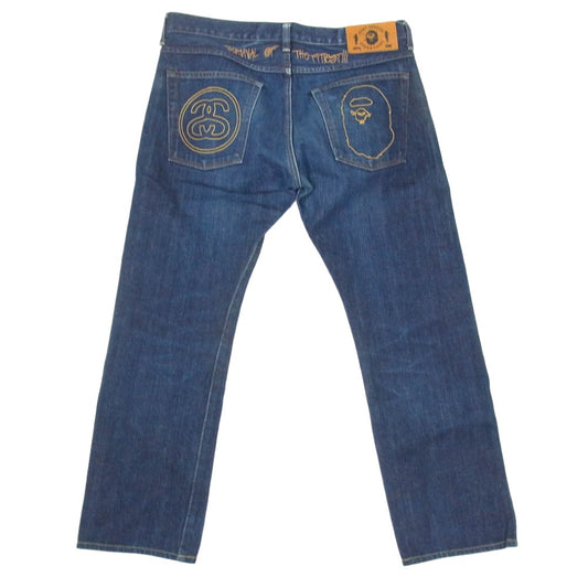 A BATHING APE アベイシングエイプ × stussy 30周年記念 モデル APE FACE SSリンク 刺繍 デニム パンツ インディゴブルー系 S【中古】