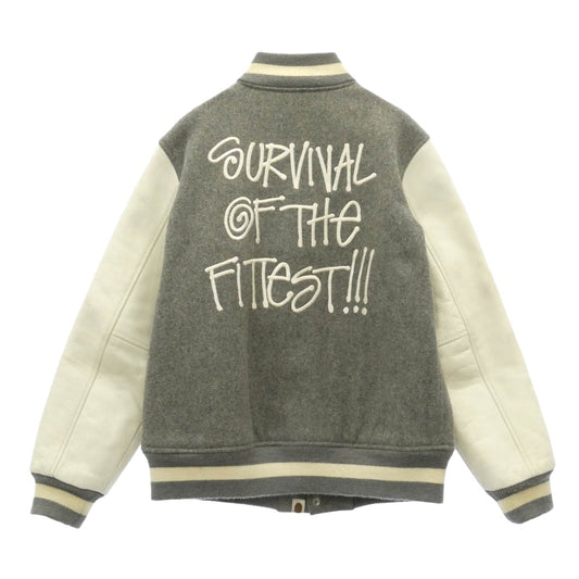 A BATHING APE アベイシングエイプ STUSSY ステューシー 11SS × STUSSY 30周年記念 モデル Varsity jacket ステューシー 袖 レザー サルフェイス SSリンクロゴ ワッペン スタジャン バーシティジャケット グレー系 M【中古】