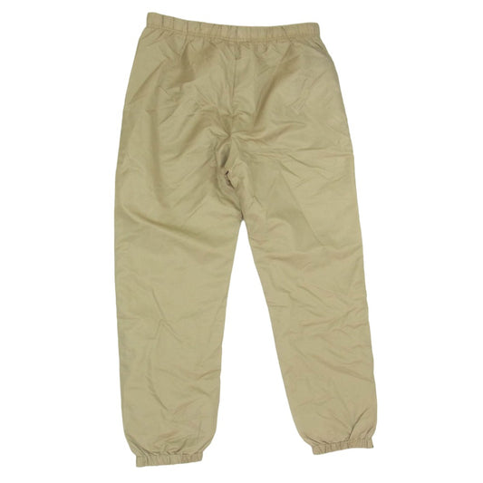 FEAR OF GOD フィアオブゴッド ESSENTIALS エッセンシャルズ 裾ジップ ラバーロゴ ナイロン イージー トラックパンツ ベージュ系 L【中古】