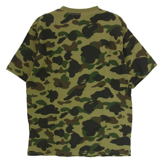 A BATHING APE アベイシングエイプ × STUSSY ステューシー 30周年記念 ワールドツアー ロゴ カモ柄 半袖 カットソー Tシャツ カーキ系 M【新古品】【未使用】【中古】