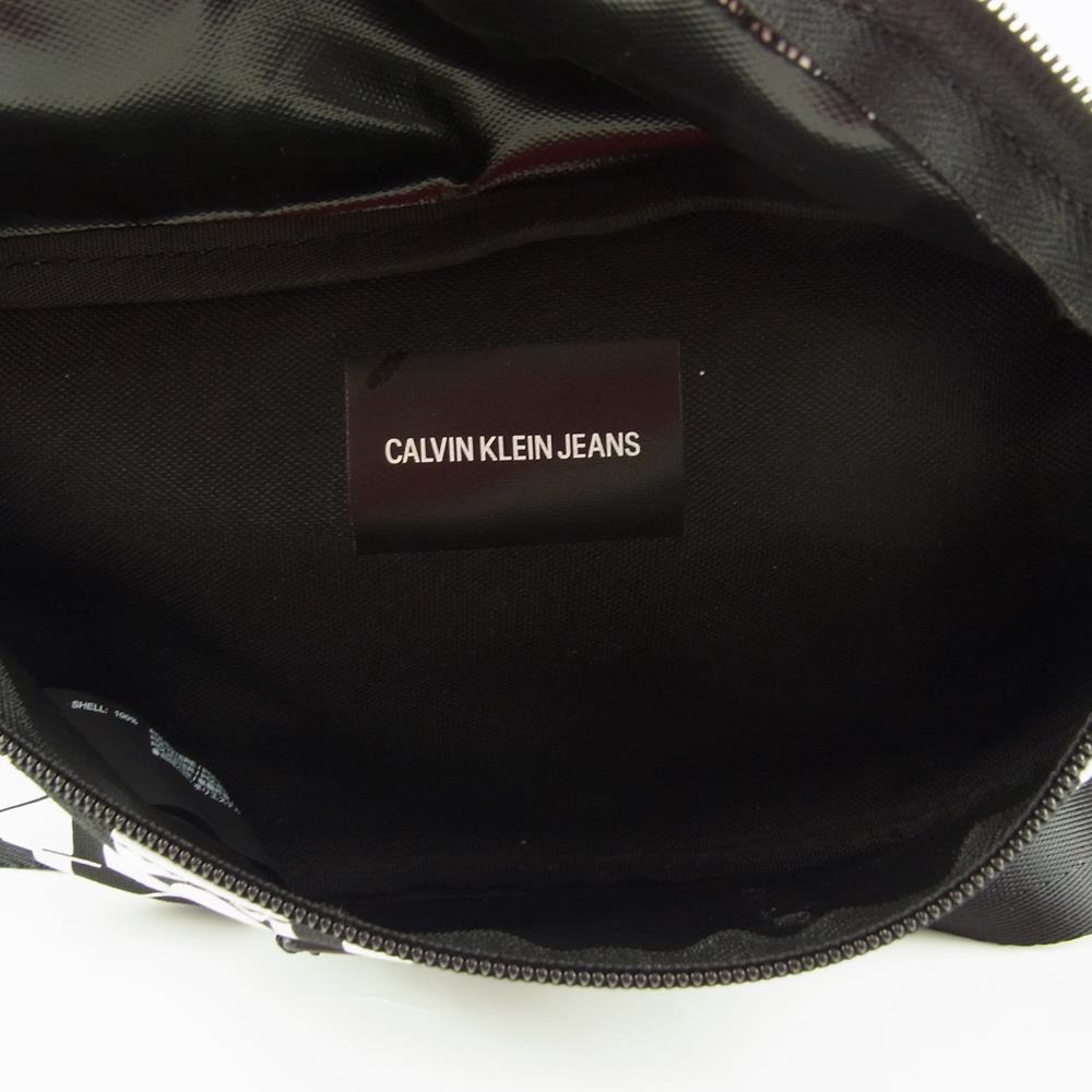 カルバンクライン ジーンズ CK チェック ロゴ 総柄 ショルダー ボディバッグ ウエストバッグ ブラック系 ホワイト系【中古】