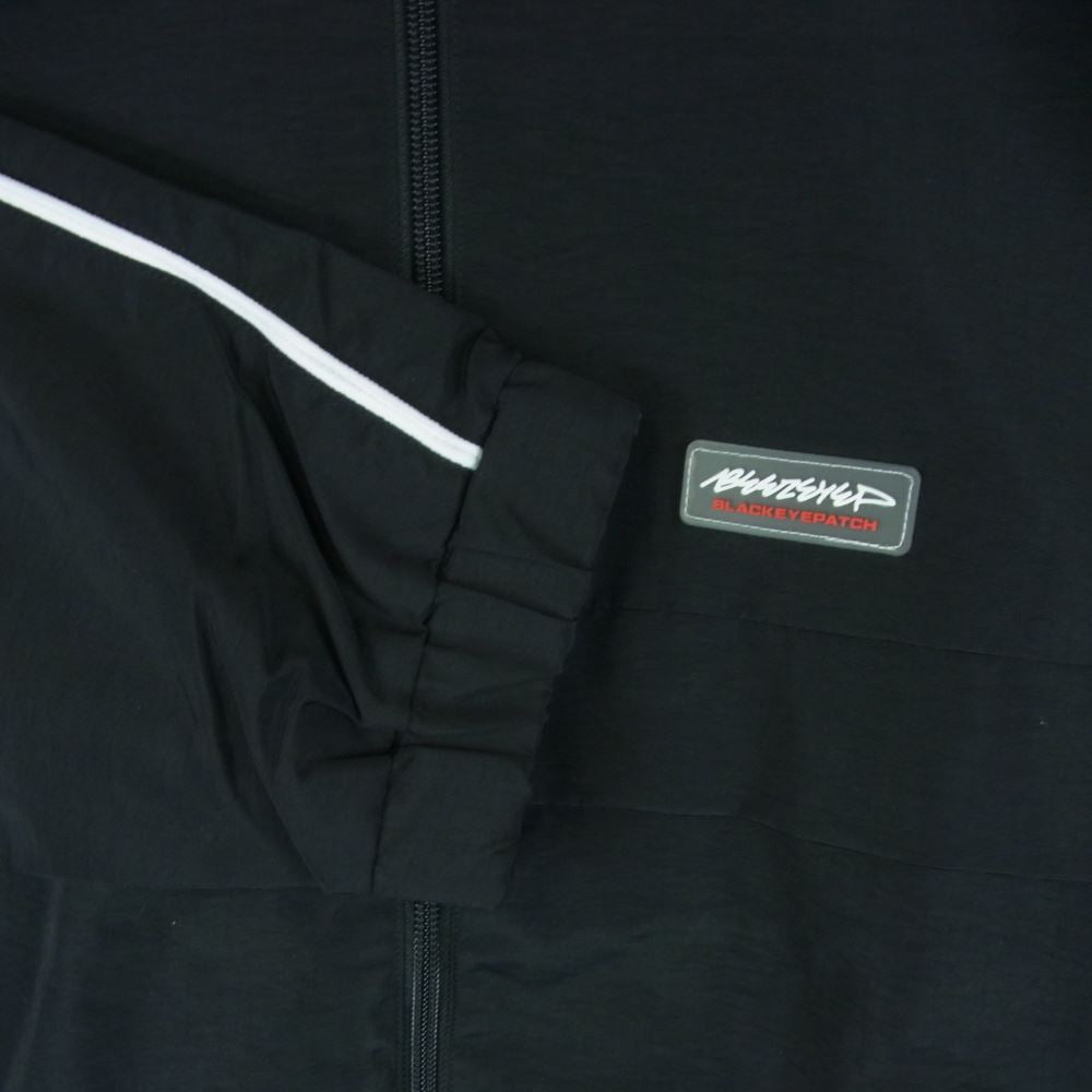 ブラックアイパッチ 21AW BEPFW210T05 ロゴラベルパッチ ナイロン トラック ジャケット ブラック系 XL【新古品】【未使用】【中古】