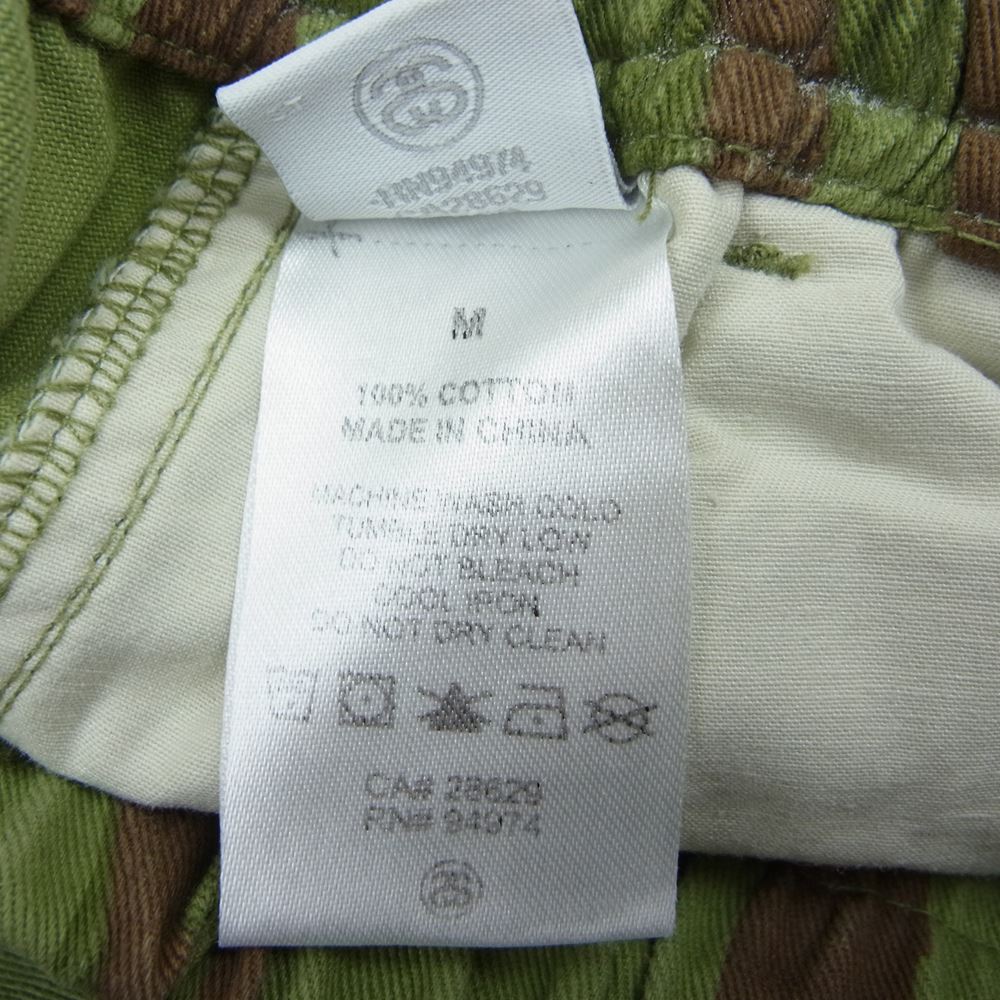STUSSY ステューシー CAMO PULL ON BEACH カモフラ トライバル リーフ総柄 ショーツ ハーフパンツ カーキ系 M【中古】