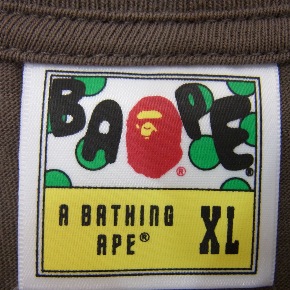 A BATHING APE アベイシングエイプ general watching tee プリント Tシャツ ブラウン系 XL【中古】