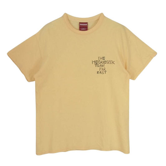 HideandSeek ハイドアンドシーク TEAM FAR EAST ハンドペイント ロゴ クルーネック プリント 半袖 Tシャツ イエロー系 M【中古】
