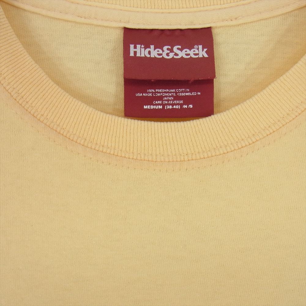 HideandSeek ハイドアンドシーク TEAM FAR EAST ハンドペイント ロゴ クルーネック プリント 半袖 Tシャツ イエロー系 M【中古】