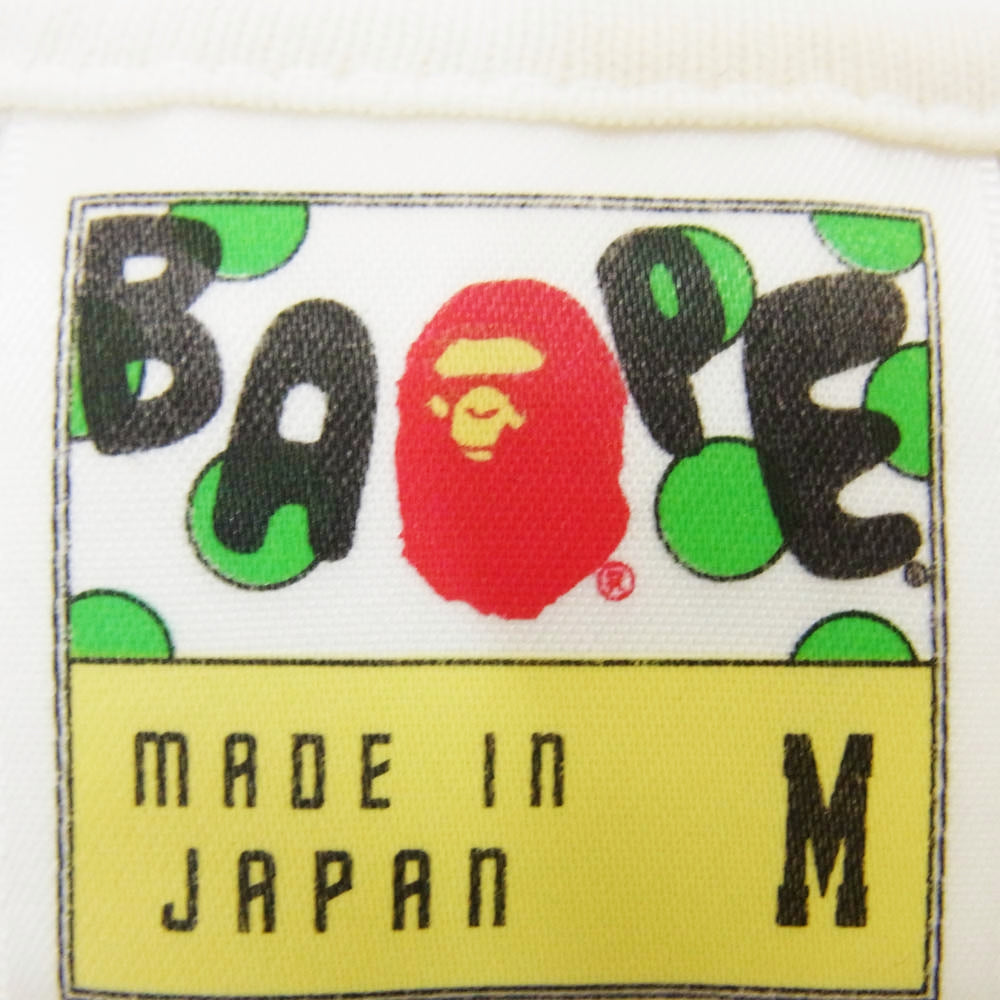 A BATHING APE アベイシングエイプ × KAWS カウズ ORIGINAL FAKE CAMO カモフラ 迷彩 半袖 Tシャツ ホワイト系 M【中古】