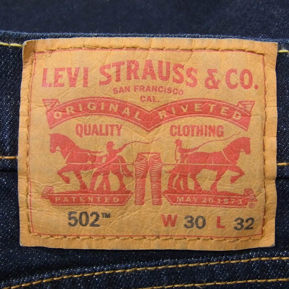 Levi's リーバイス 502 TAPER JEANS RINSEY レギュラー テーパー ストレッチ デニム パンツ インディゴブルー系 30【中古】
