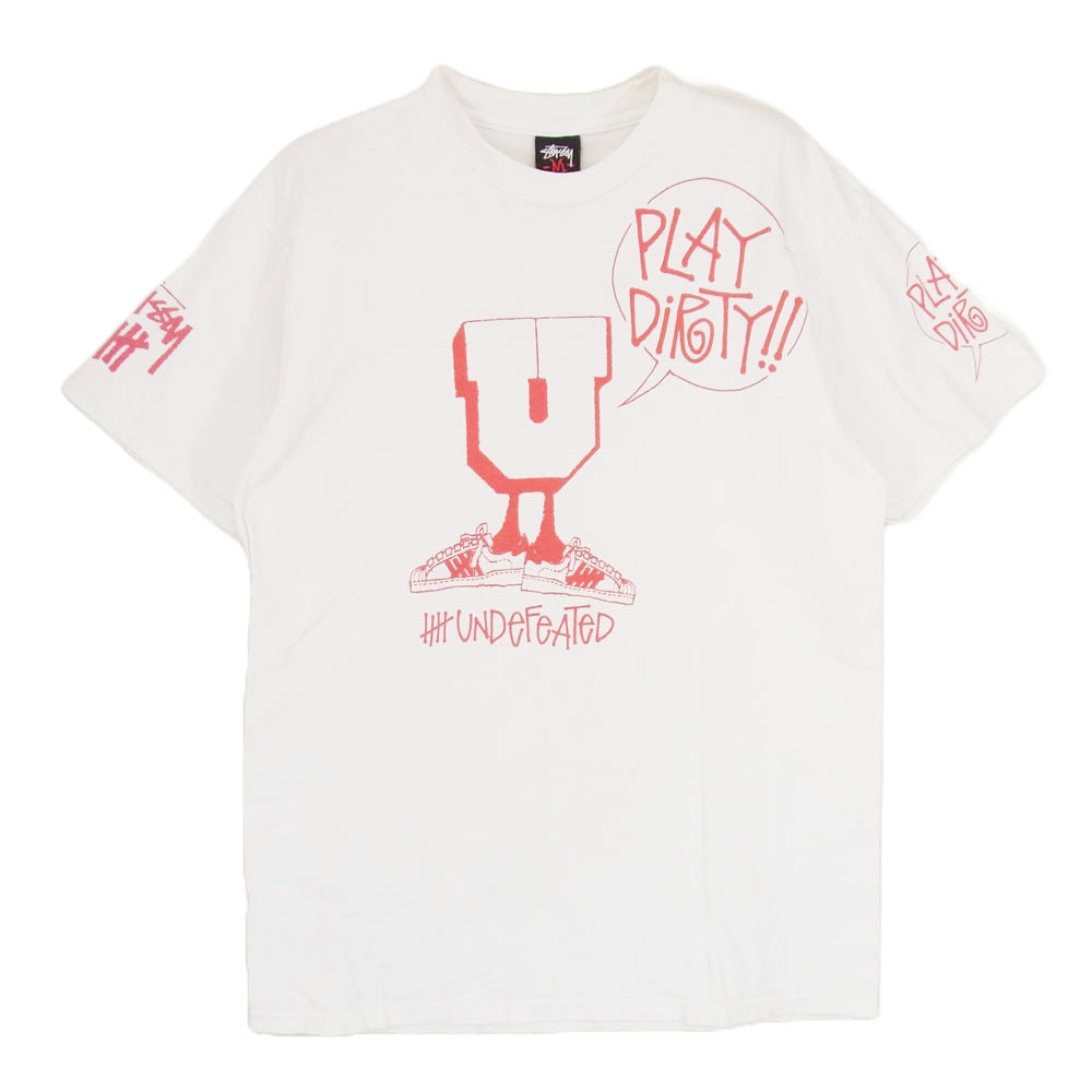 STUSSY ステューシー UNDEFEATED アンディーフィーテッド PLAY DIRTY プレイダーティ 半袖 Tシャツ ホワイト系 M【中古】