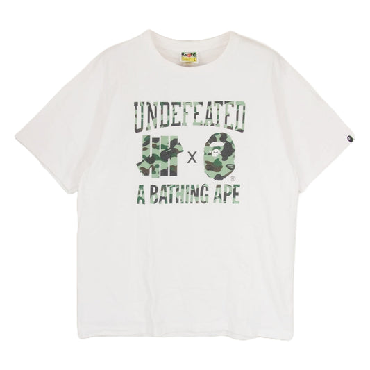 A BATHING APE アベイシングエイプ UNDEFEATED アンディーフィーテッド カモフラ ロゴプリント 半袖 Tシャツ ホワイト系 L【中古】