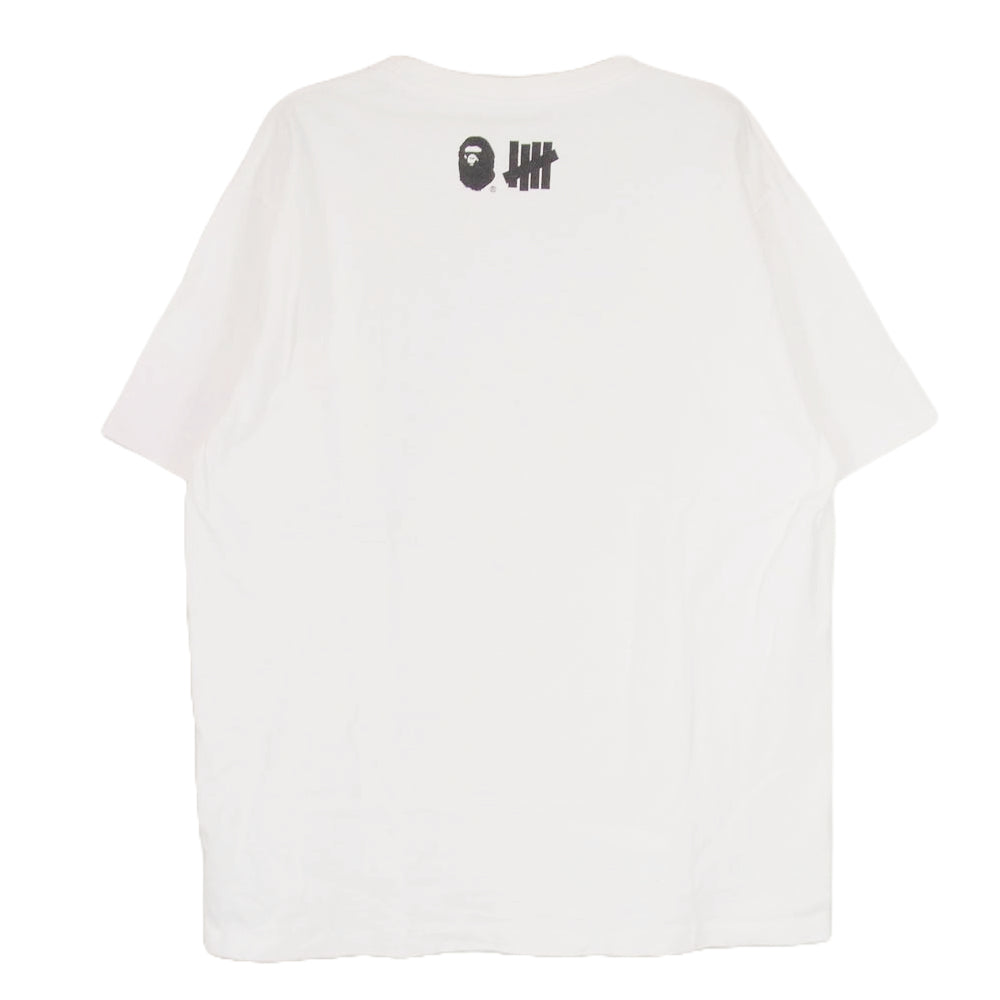 A BATHING APE アベイシングエイプ UNDEFEATED アンディーフィーテッド カモフラ ロゴプリント 半袖 Tシャツ ホワイト系 L【中古】