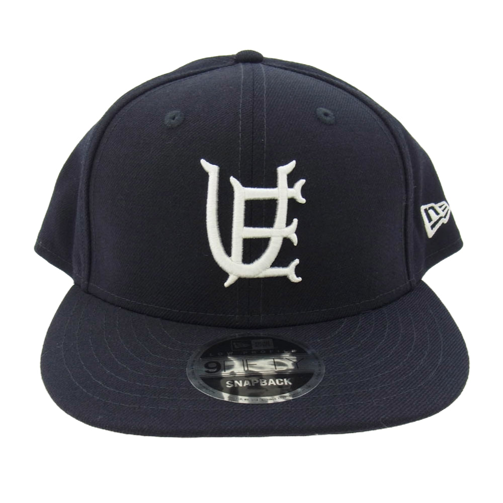 uniform experiment ユニフォームエクスペリメント 23SS UE-230054 × NEW ERA 9FIFTY LOW PROFILE CAP NAVY ニューエラ フィフティー イニシャルロゴ 刺繍 キャップ ネイビー系 ダークネイビー系【中古】
