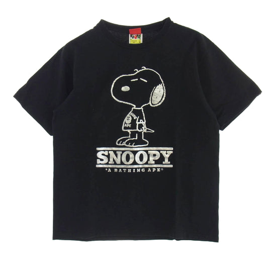 A BATHING APE アベイシングエイプ × PEANUTS  SNOOPY ピーナッツ スヌーピー プリント Tシャツ 半袖 カットソー ブラック系 L【中古】