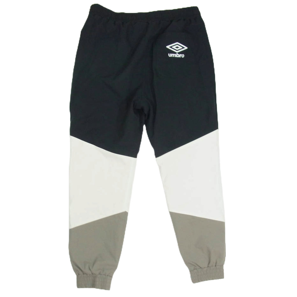 WIND AND SEA ウィンダンシー 23SS WDS-C-UMB-23-Q3-03 × UMBRO アンブロ ナイロン トラック パンツ グレー系 L【中古】