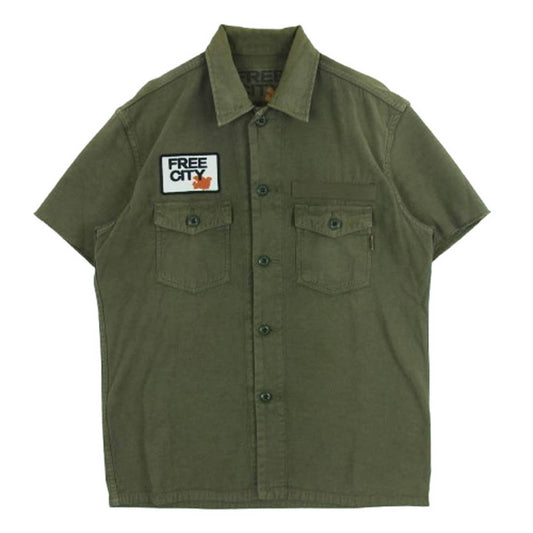 フリーシティ 70062-068 FCJSTS16 ロゴワッペン ミリタリー 半袖 シャツ コットン 日本製 グリーン系 2【中古】