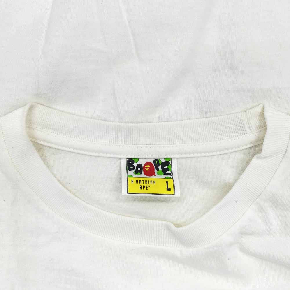 A BATHING APE アベイシングエイプ × Undefeated アンディフィーテッド BAPES NOT DEAD 半袖 Tシャツ L ホワイト系 L【中古】