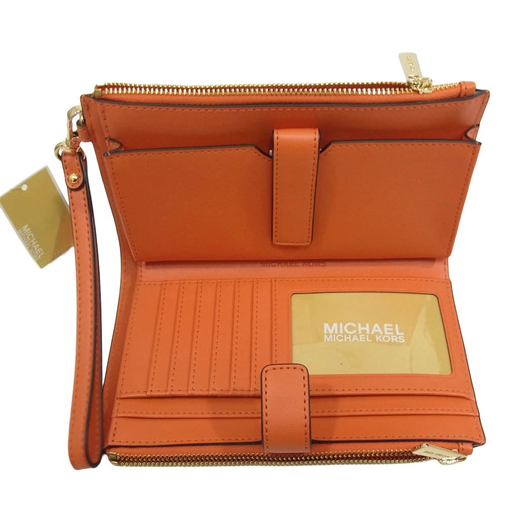 Michael Kors マイケルコース MKシグネチャー グラデーション ウォレット ポーチ オレンジ系【美品】【中古】