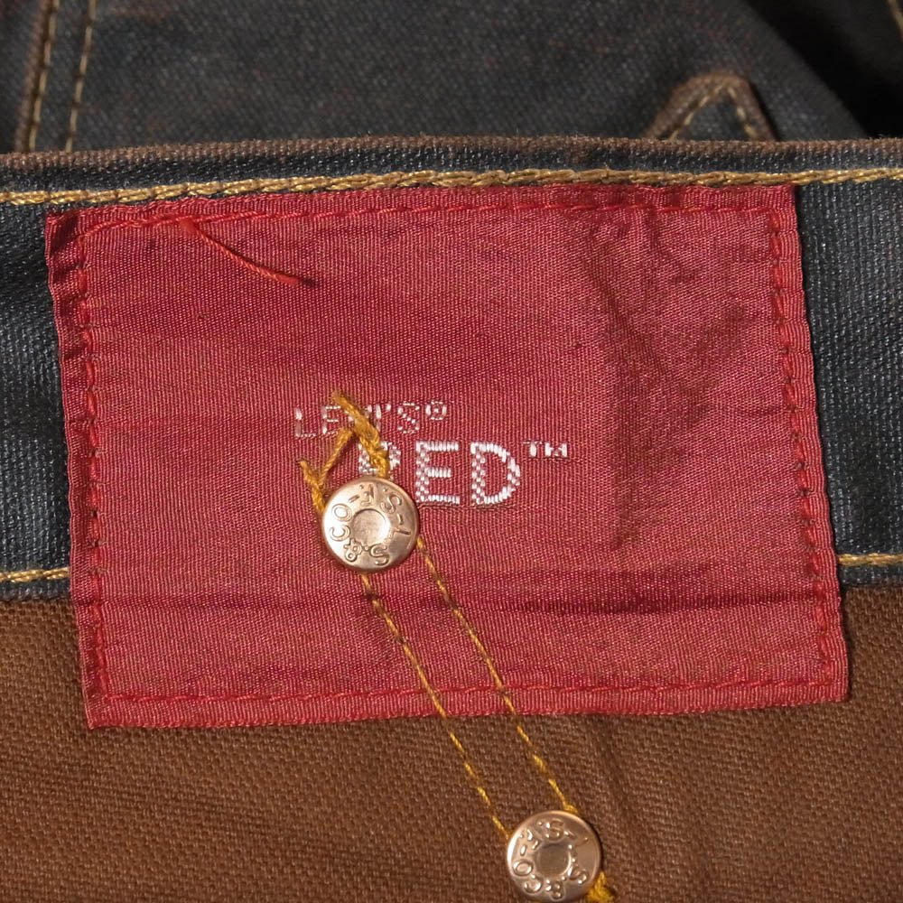 Levi's RED リーバイスレッド 立体裁断 レザーシンチバック コーティング デニムパンツ 黒茶系 W30程度【中古】