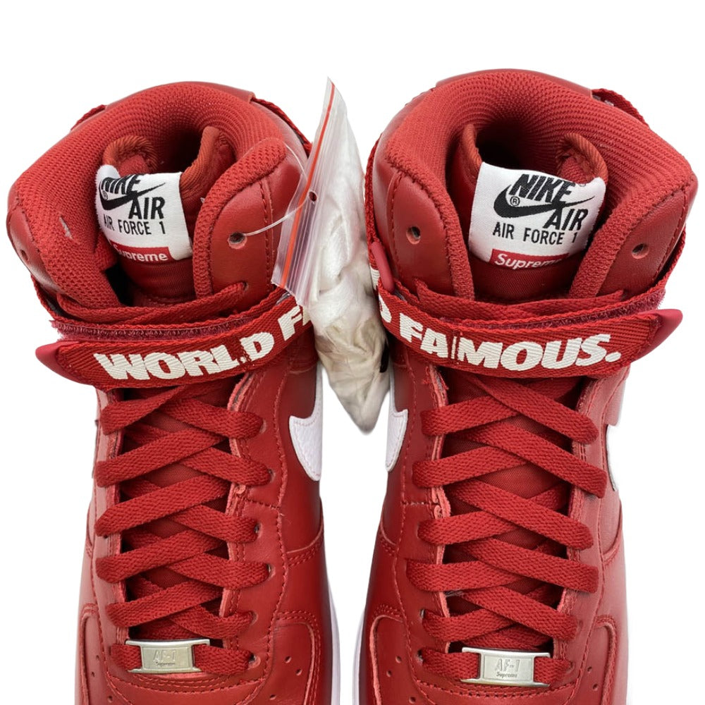 Supreme シュプリーム 14AW 698696-610 × Nike Air Force 1 High World Famous Red【フェイクバスターズ鑑定済】ナイキ エアフォース1 ハイ ワールドフェイマス ハイカット スニーカー レッド系 27.5cm【新古品】【未使用】【中古】