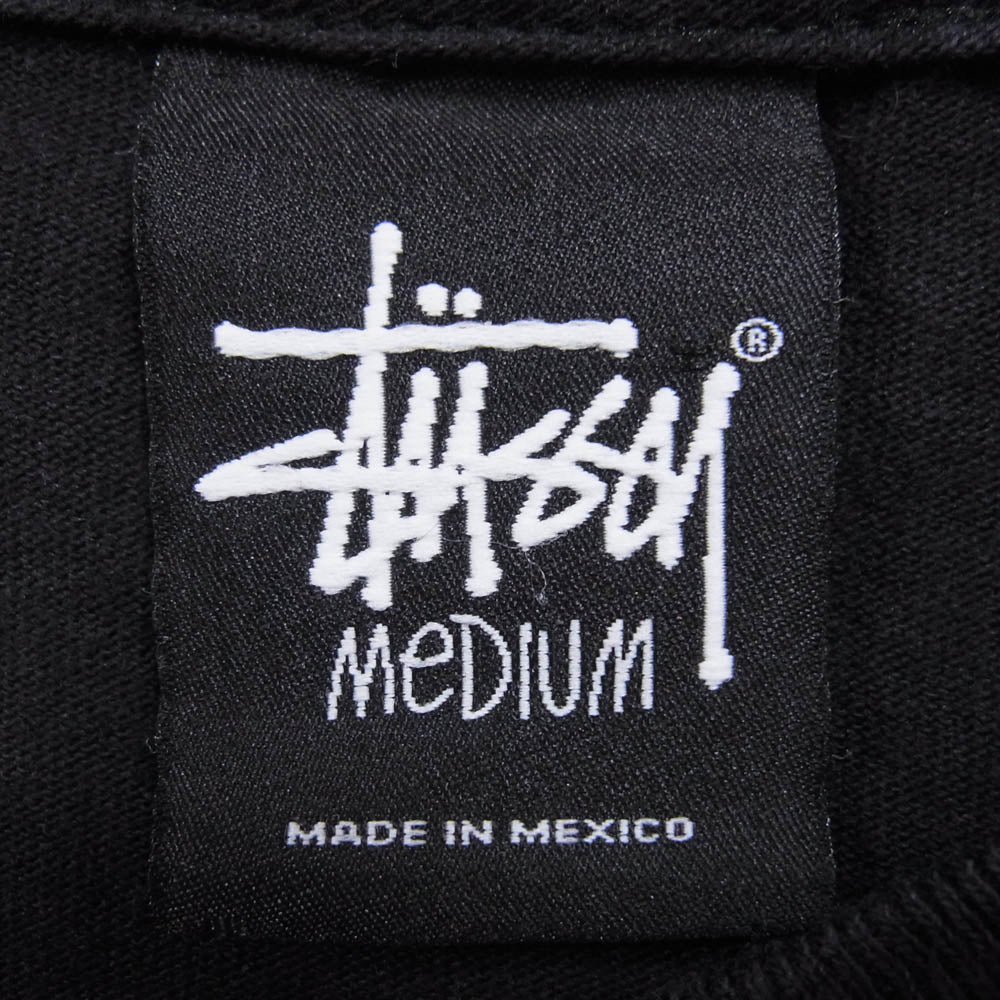 STUSSY ステューシー 【フェイクバスターズ鑑定済】2010 サッカーW杯記念 エンブレム ロングスリーブ 長袖 Tシャツ カットソー ブラック系 M【中古】