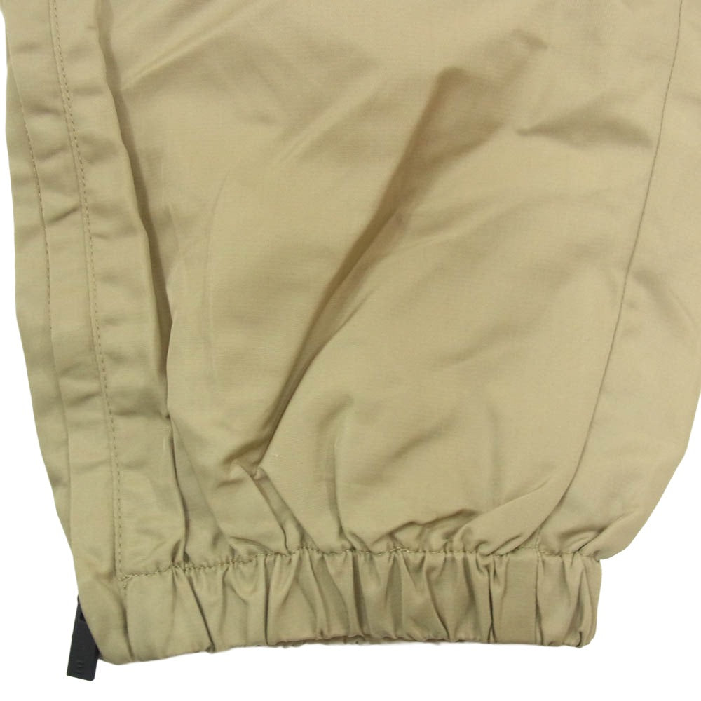 FEAR OF GOD フィアオブゴッド ESSENTIALS エッセンシャルズ 裾ジップ ラバーロゴ ナイロン イージー トラックパンツ ベージュ系 L【中古】