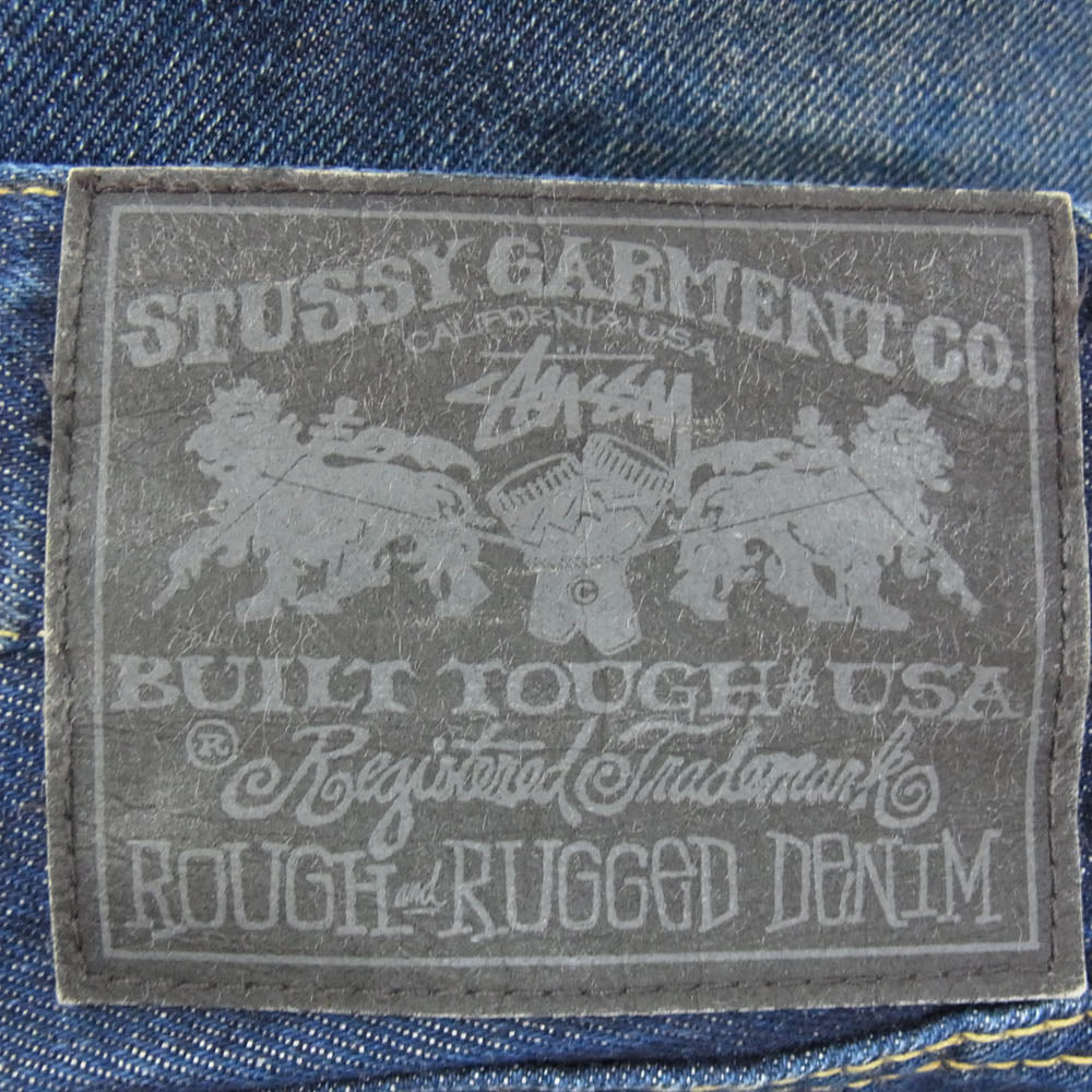 STUSSY ステューシー 【フェイクバスターズ鑑定済】金タグ バックポケット rough and rugged denim SSロゴ 刺繍 ライトオンス デニム パンツ インディゴブルー系 30【中古】