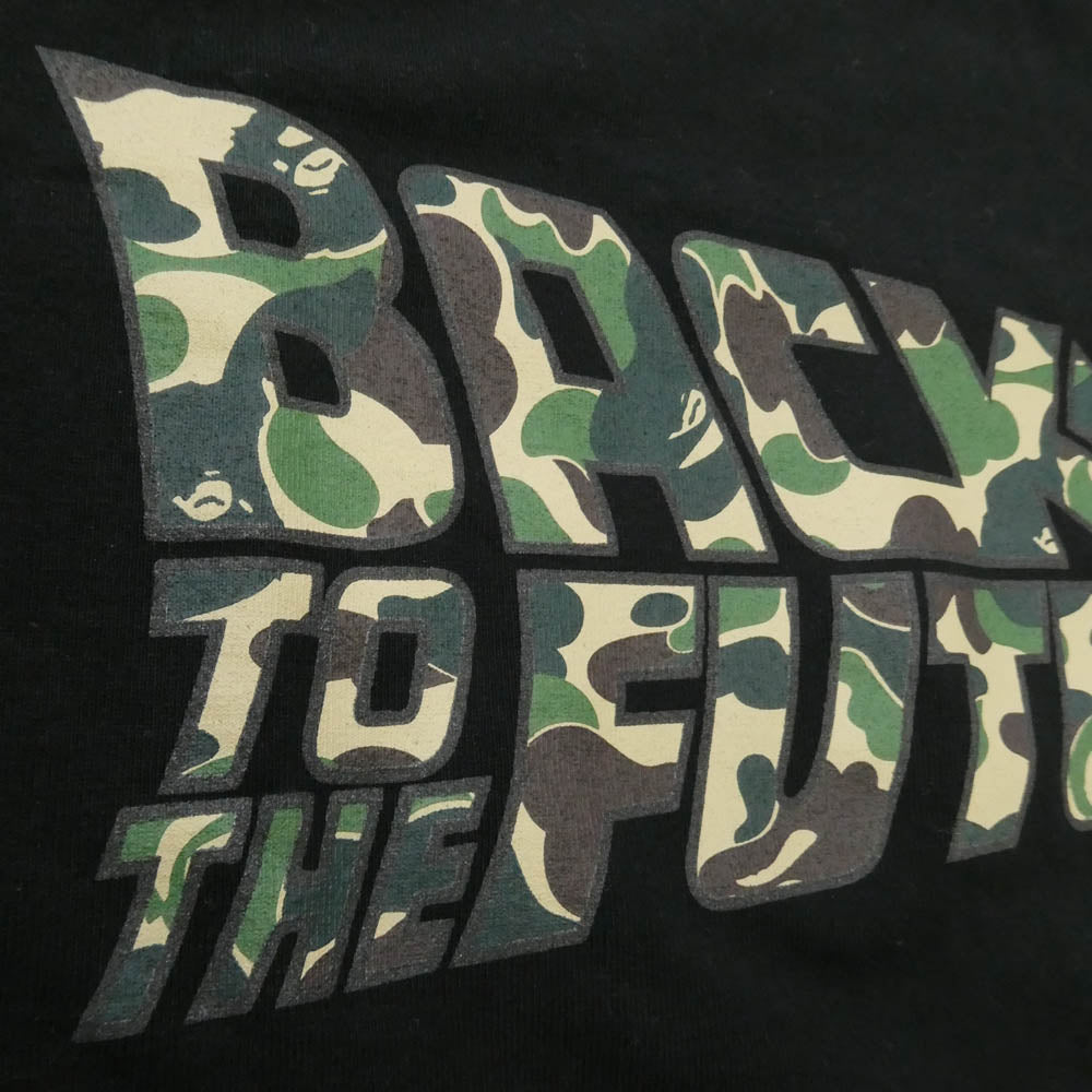 A BATHING APE アベイシングエイプ BACK TO THE FUTURE バックトゥザフューチャー カモフラロゴ クルーネック 半袖 Tシャツ ブラック系 M【中古】