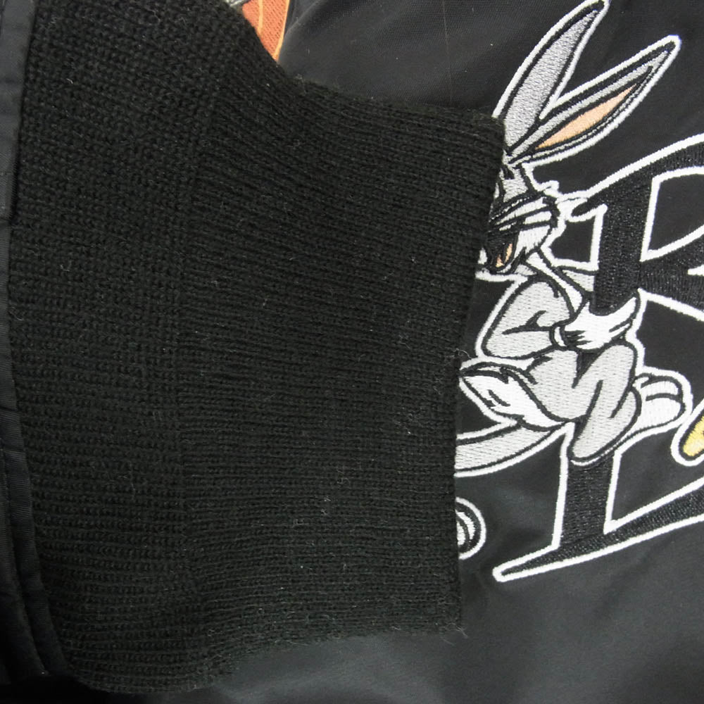 ALPHA アルファ TA0420-001 × LOONEY TUNES MA-1 フライト ジャケット ブラック系 L【新古品】【未使用】【中古】