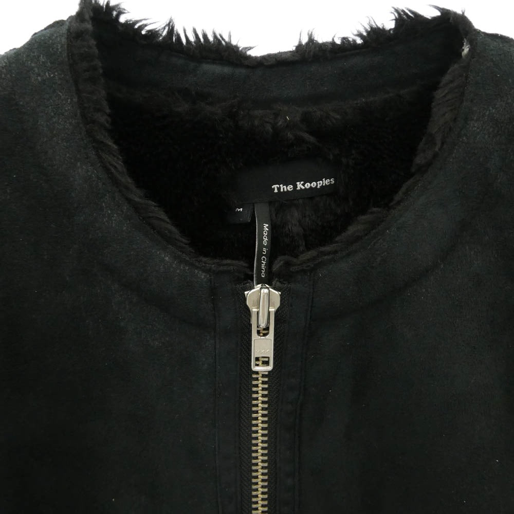 クープルズ フェイクムートン ノーカラー ジップアップ ジャケット ブラック系 M【中古】
