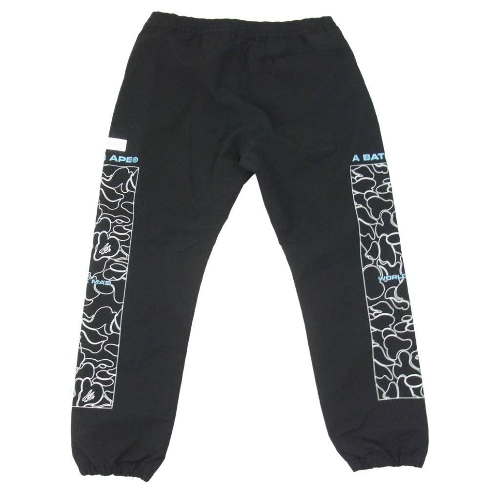 A BATHING APE アベイシングエイプ 001PTH801011M Rip Stop Track Pants サイドプリント リップストック トラックパンツ ブラック系 L【中古】 A BATHING APE アベイシングエイプ 001PTH801011M Rip Stop Track