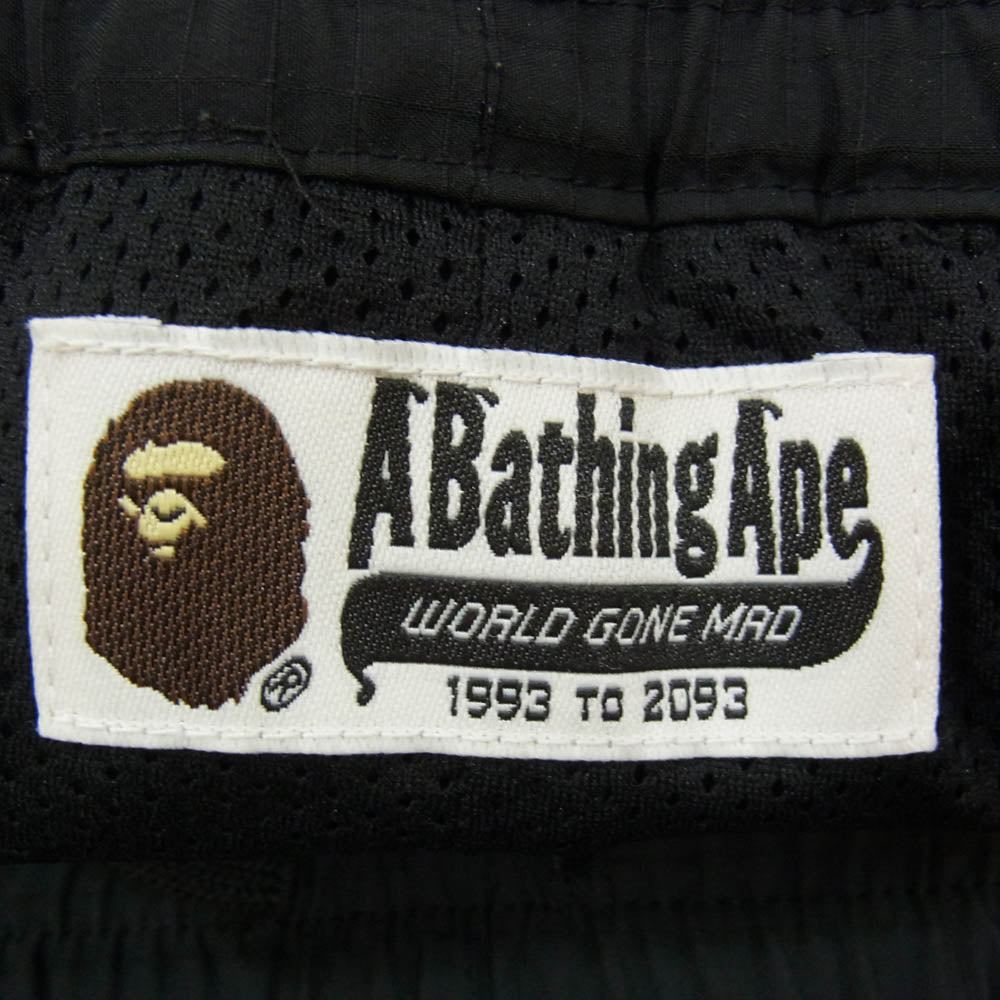 A BATHING APE アベイシングエイプ 001PTH801011M Rip Stop Track Pants サイドプリント リップストック トラックパンツ ブラック系 L【中古】