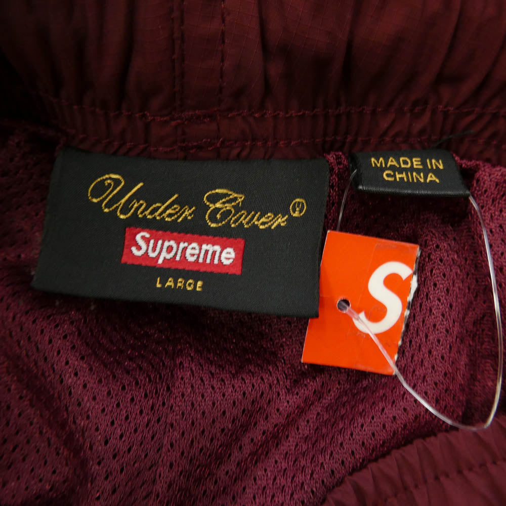 Supreme シュプリーム UNDERCOVER アンダーカバー 23SS × UNDERCOVER アンダーカバー Track pants 刺繍 総柄 トラックパンツ レッド バーガンディ系 L【美品】【中古】