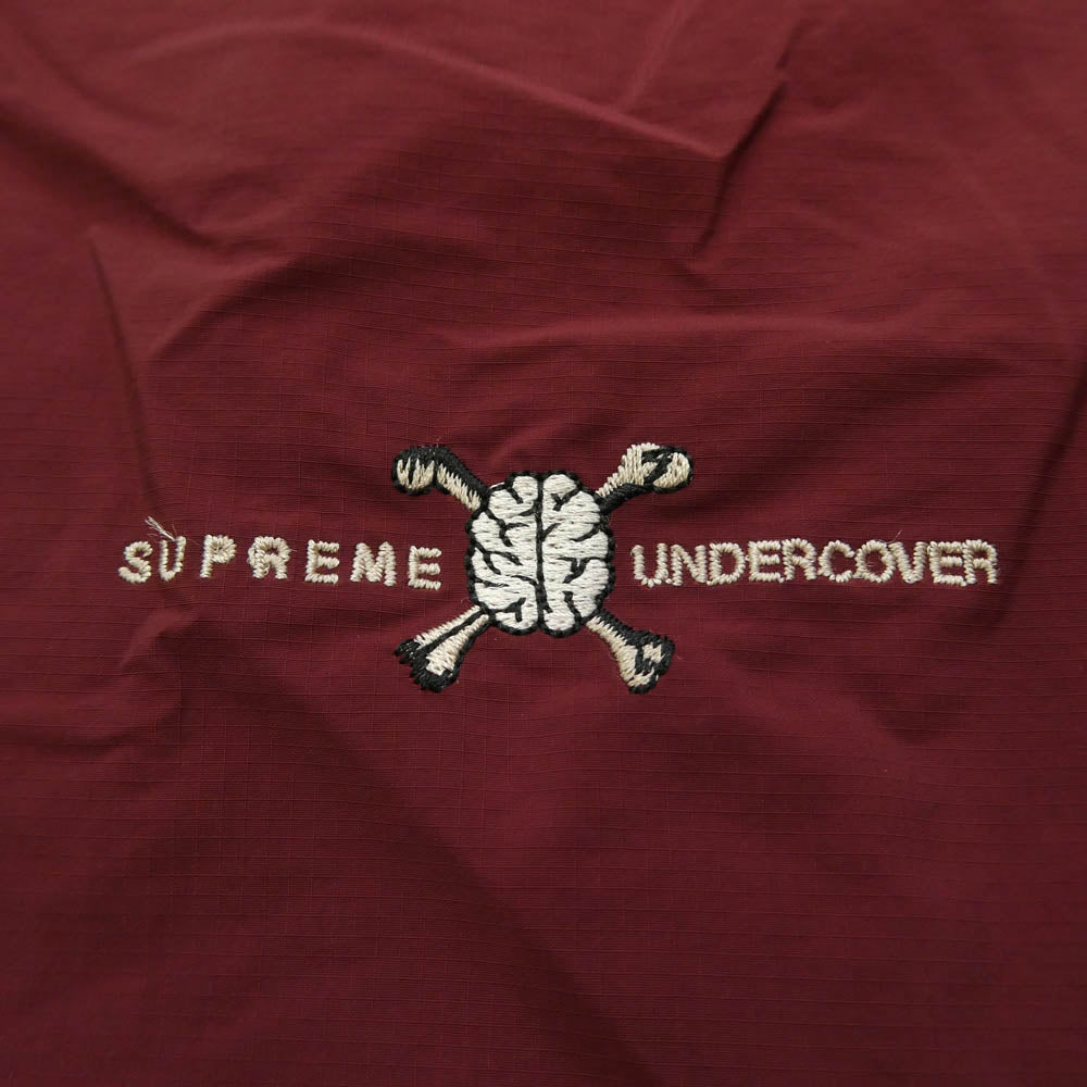 Supreme シュプリーム UNDERCOVER アンダーカバー 23SS × UNDERCOVER アンダーカバー Track pants 刺繍 総柄 トラックパンツ レッド バーガンディ系 L【美品】【中古】