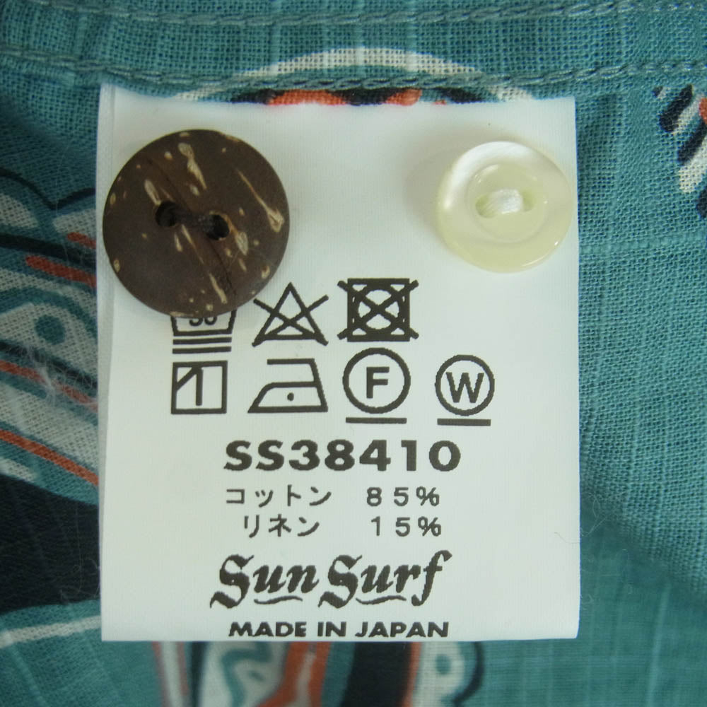 SUN SURF サンサーフ SS38410 COTTON LINEN SLUBYARN OPEN SHIRTS NATIVE MASKS ネイティブ マスク 総柄 抜染プリント コットン リネン 半袖 アロハ シャツ ライトブルー系 XL 17 - 17.5【中古】