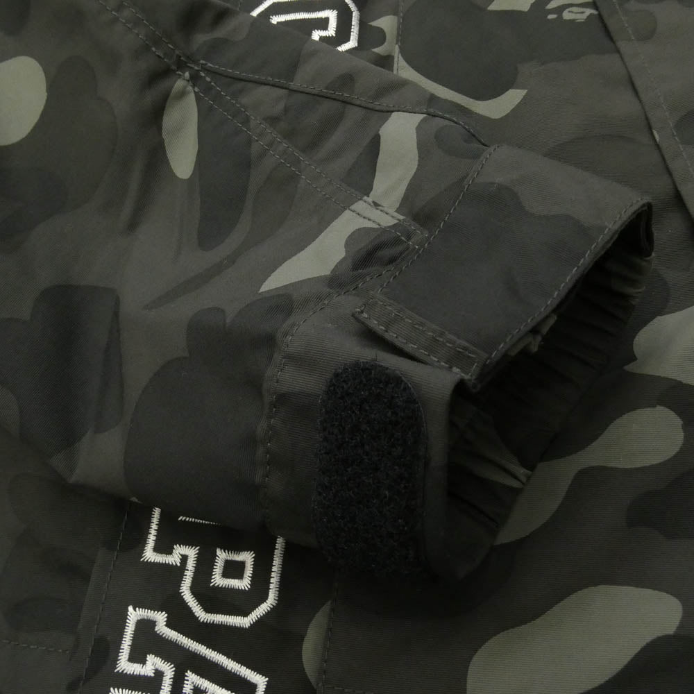 A BATHING APE アベイシングエイプ X BLACK EYE PATCH COLOR CAMO SNOWBOARD JACKET ブラックアイパッチ カモ柄 スノーボードジャケット マウンテン ジャケット ダークグレー系 M【中古】