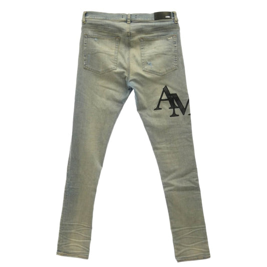 AMIRI アミリ 26SS AMDNSY1114 Staggered Logo Skinny Jean レザーロゴパッチ ダメージ加工 スキニー デニムパンツ ライトブルー系 UK 33【中古】