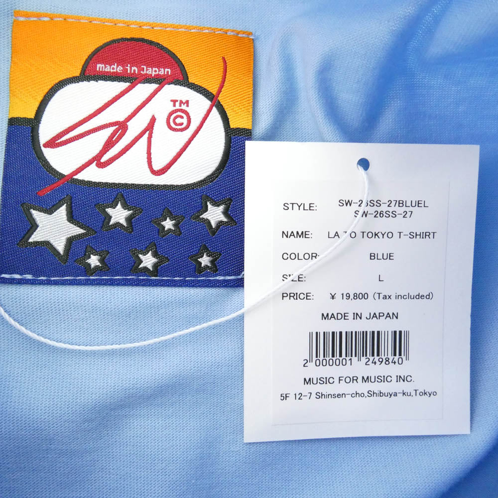 エスダブリュージェーピー 26SS SW-26SS-27 LA TO TOKYO T-SHIRT ロゴプリント クルーネック 半袖 Tシャツ ブルー ライトブルー系 L【新古品】【未使用】【中古】