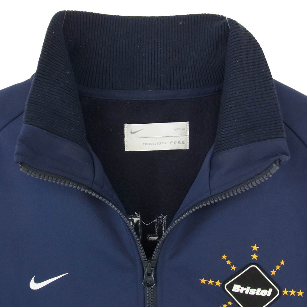 F.C.R.B. エフシーアールビー F.C.R.B. エフシーアールビー 378403 × NIKE ナイキ エンブレム スター刺繍 ラバーロゴ トラックジャケット ネイビー系 M【中古】