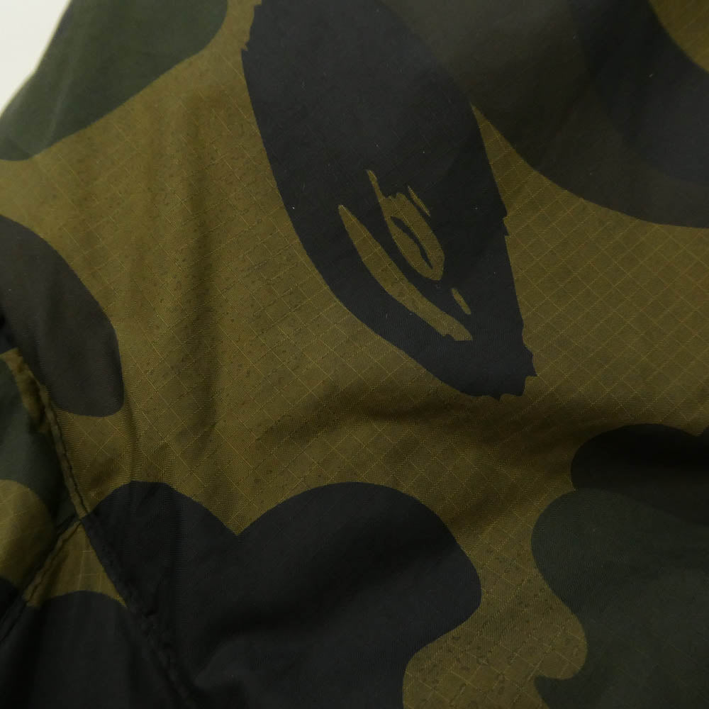 A BATHING APE アベイシングエイプ 1870-141-048 1ST CAMO ファーストカモ ワンポイント レザーパッチ ロゴ リバーシブル グリーンカモ キルティング ダウン ジャケット カモフラ 猿迷彩 グリーン系 L【中古】