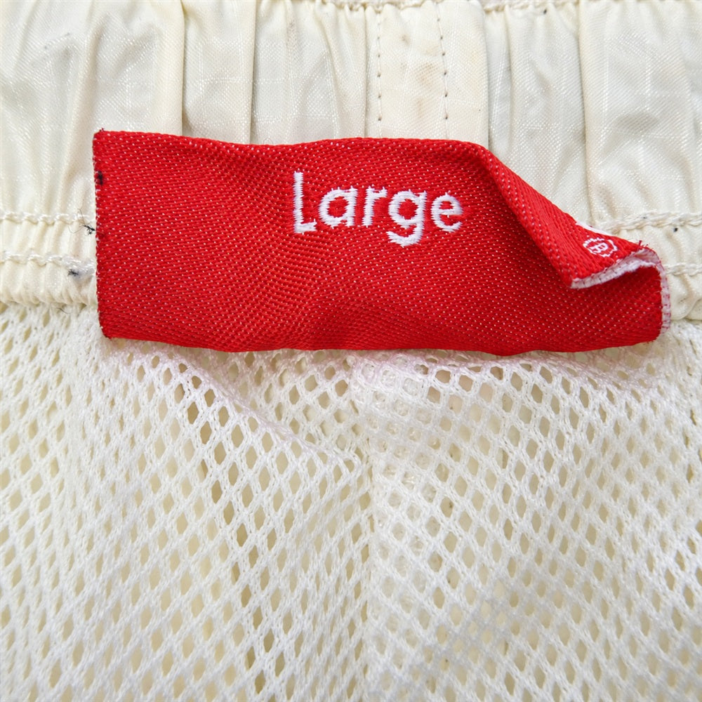 Supreme シュプリーム ワングラム期 バック ロゴ 裾ジップ ナイロン トラック パンツ オフホワイト系 L【中古】