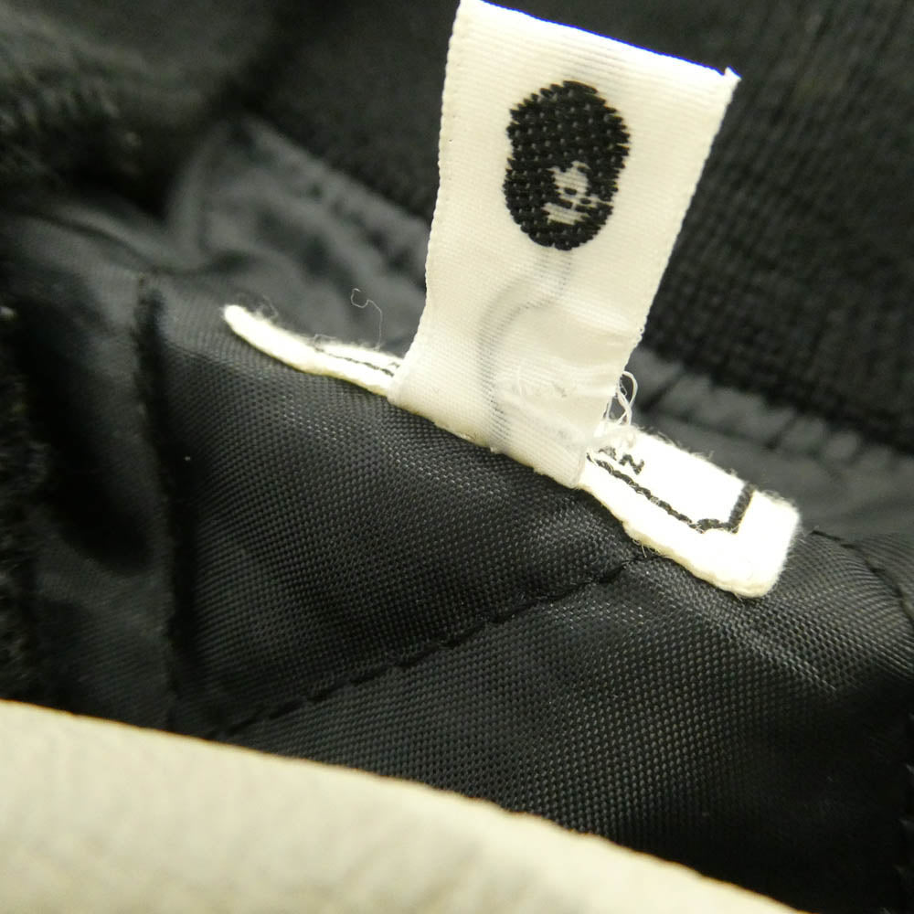 A BATHING APE アベイシングエイプ STUSSY ステューシー × STUSSY 30th Anniversary Varsity Jacket ステューシー 30周年 ロゴ ワッペン SSリンク スタジャン ジャケット ブラック系 ホワイト系 L【中古】