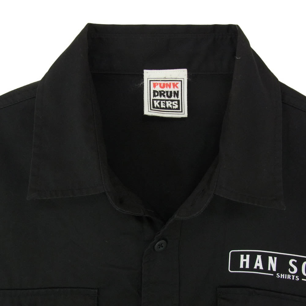 PUNK DRUNKERS パンクドランカーズ HAN SODE フロント バックプリント 胸ポケット 半袖 ワーク シャツ ブラック系 L【中古】