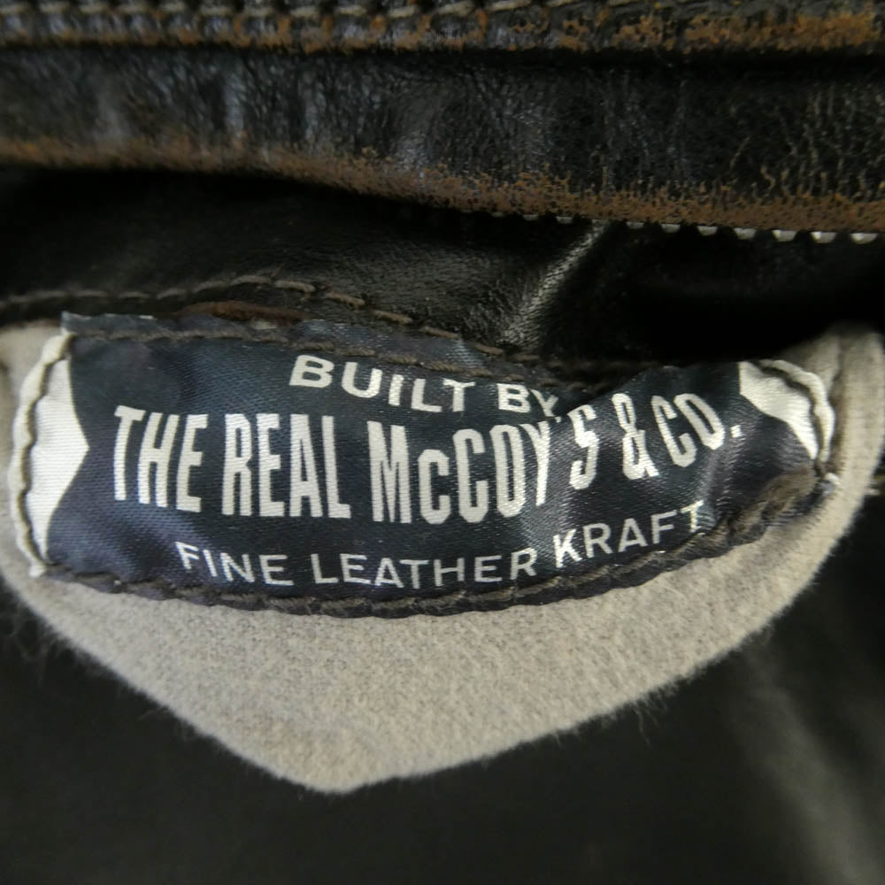The REAL McCOY'S ザリアルマッコイズ J-100 BUCO HORSEHIDE SINGLE RIDERS LEATHER JACKET ブコ 茶芯 ホースハイド スタンドカラー シングル ライダース レザー ジャケット ブラック系 38【中古】