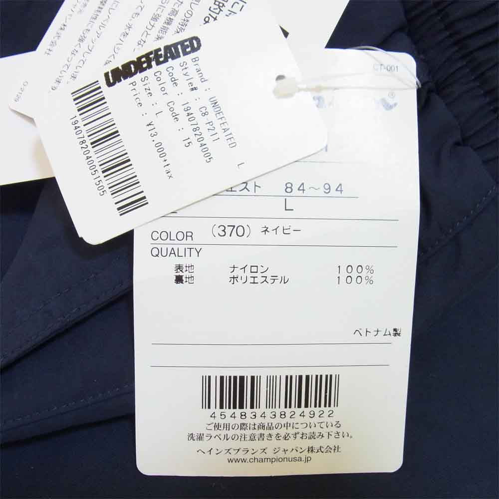 UNDEFEATED アンディフィーテッド × CHAMPION チャンピオン LOGO NYLON PANT ロゴ ナイロン パンツ ネイビー系 L【新古品】【未使用】【中古】