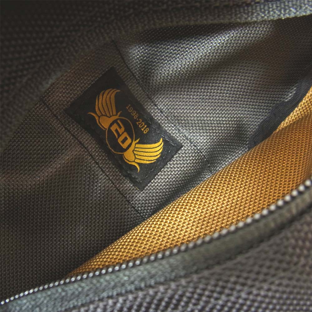 BRIEFING ブリーフィング 20TH ANNIVERSARY PROLATE POUCH CRAZY カーキ系【新古品】【未使用】【中古】