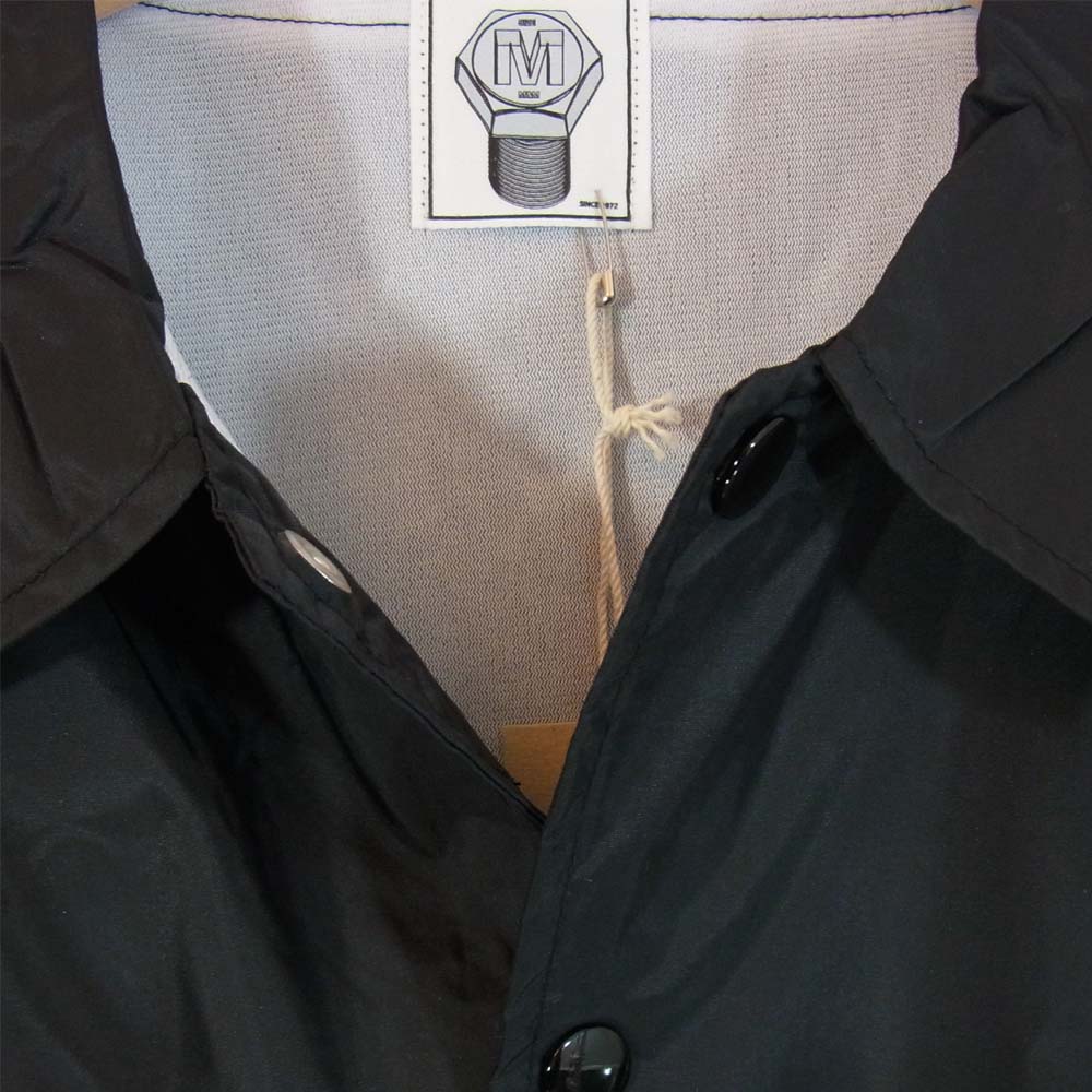 エムアンドエムカスタムパフォーマンス PRINT WINDBREAKER プリント ウィンドブレーカー コーチジャケット ブラック系 M【新古品】【未使用】【中古】