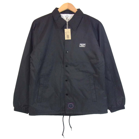 エムアンドエムカスタムパフォーマンス PRINT WINDBREAKER プリント ウィンドブレーカー コーチジャケット ブラック系 S【新古品】【未使用】【中古】